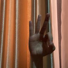 Isyarat fingerspelling huruf O