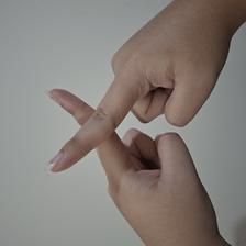 Isyarat fingerspelling huruf X